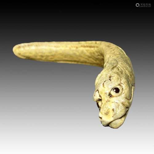 UNSUAL LONG NETSUKE DRAGON HEAD, 18TH CENTURY