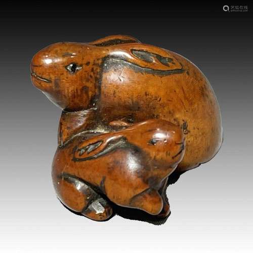 JAPANESE BOXWOOD NETSUKE DEPICTING 2 RABBITS, MEIJI PERIOD, ...