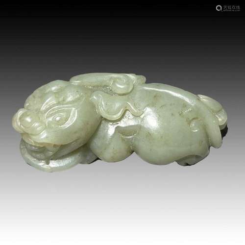 A CHINESE PALE CELADON COLOURED JADE QILIN, QING DYNASTY (16...