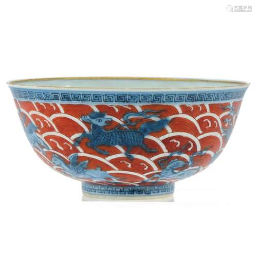 A BLUE AND RED BOWL