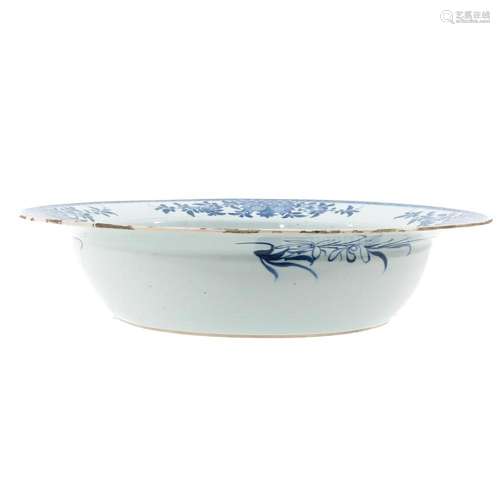 A BLUE AND WHITE WASH BASIN