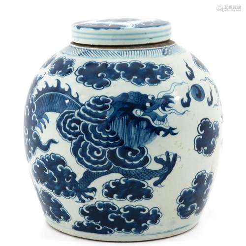 A BLUE AND WHITE JAR WITH COVER