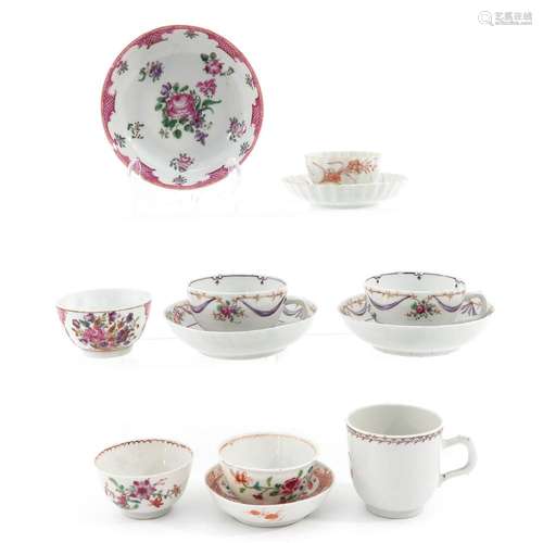 A COLLECTION OF CUPS AND SAUCERS