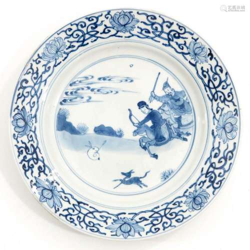 A BLUE AND WHITE PLATE