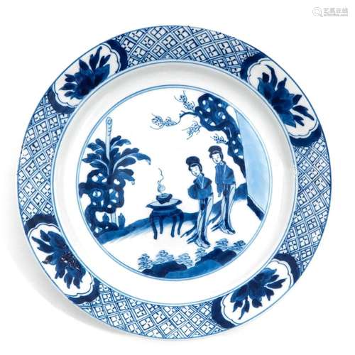 A BLUE AND WHITE PLATE