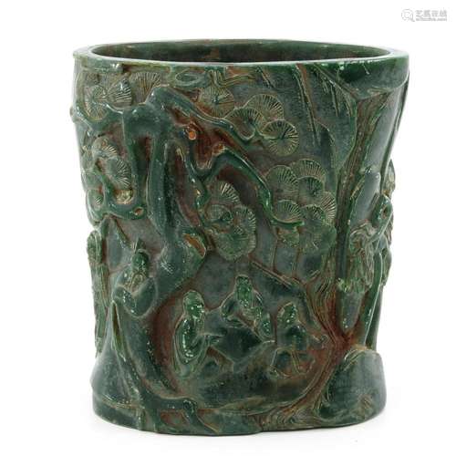 A CARVED JADE BRUSH POT