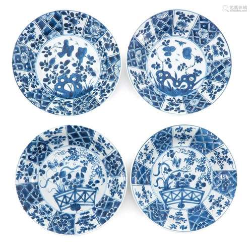 A LOT OF 4 BLUE AND WHITE PLATES