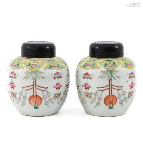 A PAIR OF FAMILLE ROSE GINGER JARS