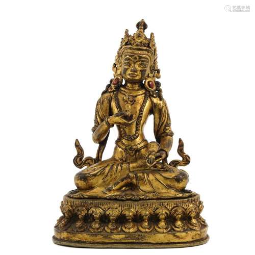 A GILT BRONZE BUDDHA SCULPTURE