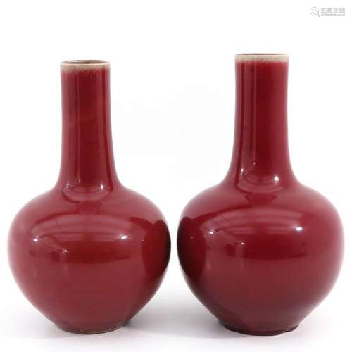 A PAIR OF SANG DE BOEUF VASES