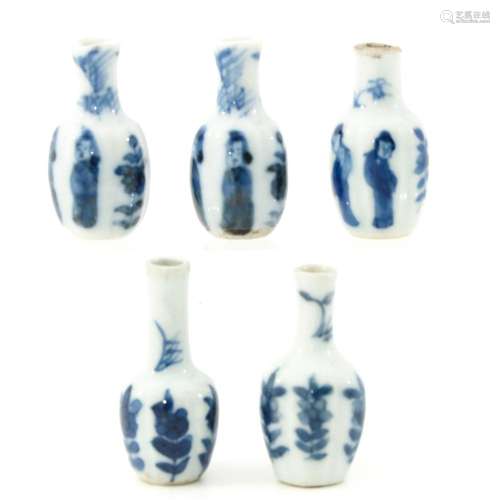 A COLLECTION OF MINIATURE VASES