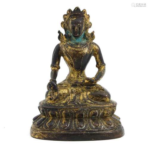 A BRONZE GILT BUDDHA