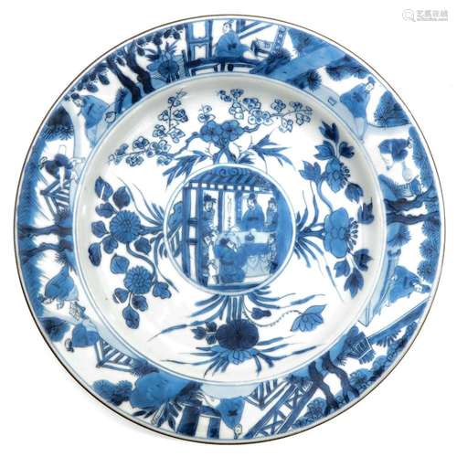 A BLUE AND WHITE PLATE