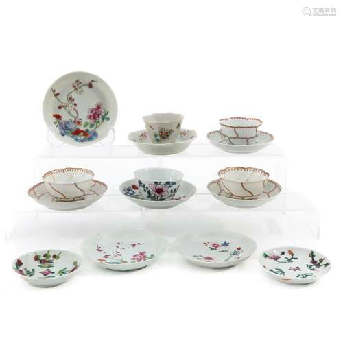 A COLLECTION OF CUPS AND SAUCERS