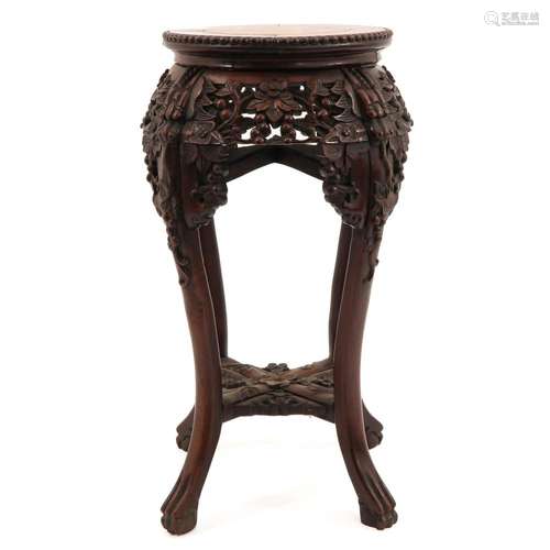 A CARVED CHINESE SIDE TABLE