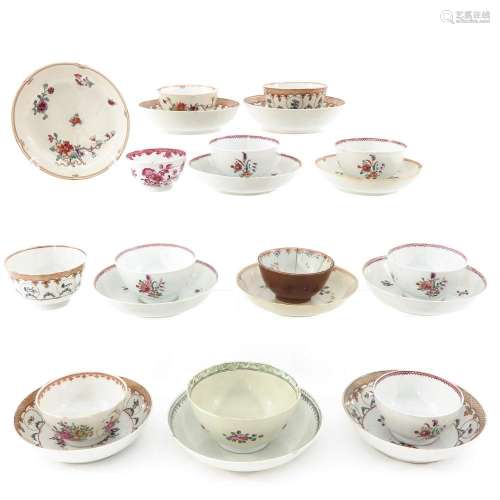 A COLLECTION OF CUPS AND SAUCERS