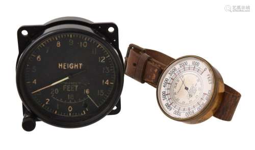 AN EARLY AVIATOR’S ANEROID WRIST BAROMETER WITH ALTIMETER