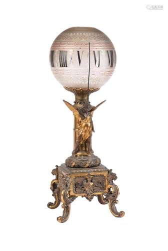 A SCARCE FRENCH PATINATED AND GILT METAL ROTATING GLASS GLOB...