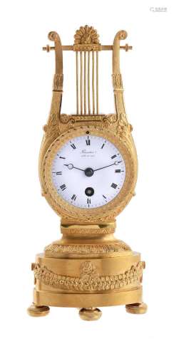 A FRENCH EMPIRE SMALL ORMOLU LYRE-SHAPED MANTEL TIMEPIECE