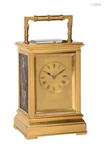 A FINE GILT BRASS REPEATING CARRIAGE CLOCK INSET WITH LIMOGE...