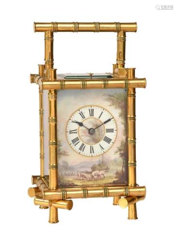 A FRENCH GILT BAMBOO CASED REPEATING CARRIAGE CLOCK WITH PAI...