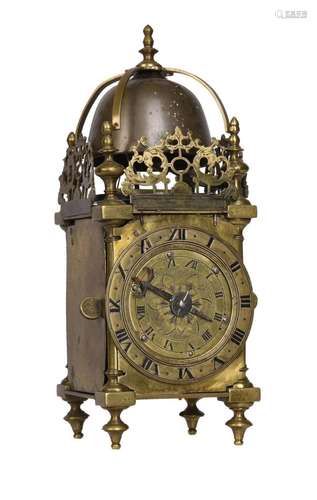 AN INTERESTING BRASS MINIATURE HOUR-STRIKING LANTERN CLOCK W...