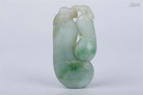 A Jadeite Gourd Shaped Pendant.