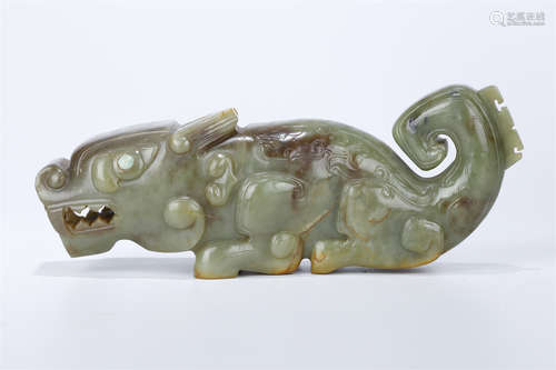 An Antique Jade Auspicious Beast Sculpture.