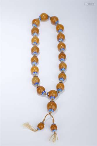 A String of Handheld Field Yellow Stone Beads.