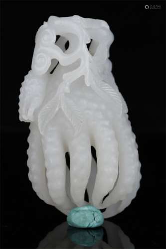 A Hetian Jade Buddha's Hand Sculpture.