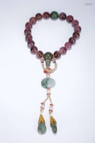 A String of Handheld Tourmaline Beads.