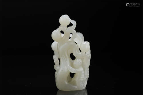 A Hetian Jade Boy and Peaches Sculpture.