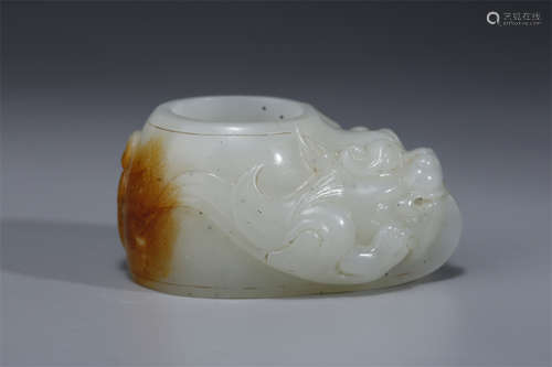 An Antique Jade Thumb Ring.