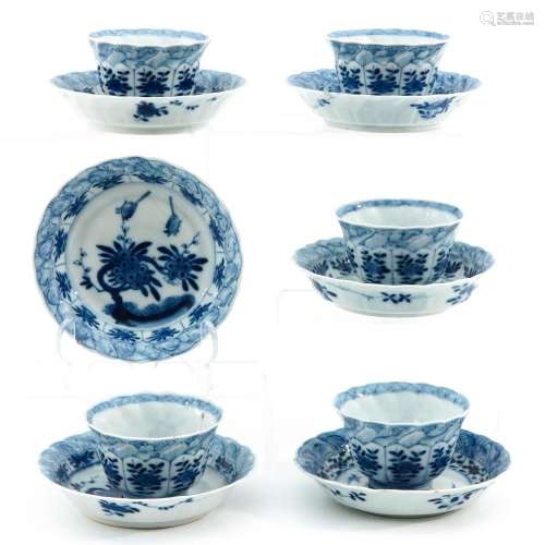 A Collection of Blue and White Cups and Saucers