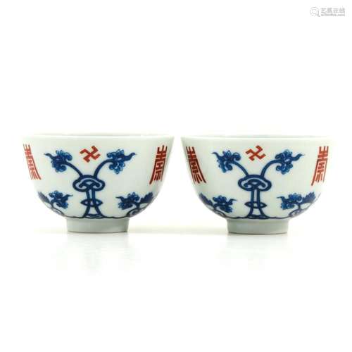 A Pair of Red and Blue Cups