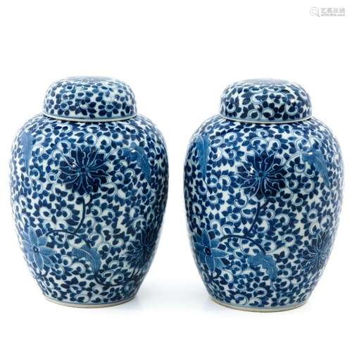 A Pair of Blue and White Jars with Covers