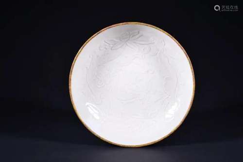 A CARVED DING YAO-GLAZED DISH.SONG PERIOD