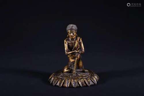 A GILT-BRONZE FIGURE OF LUOHAN.QING PERIOD