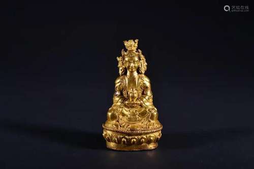 A GILT-BRONZE FIGURE OF GURU.QING PERIOD