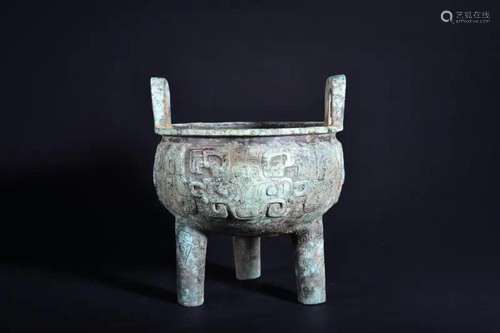 A BRONZE TRIPOD FOOD VESSEL