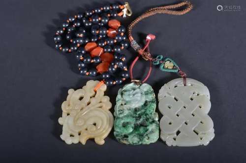 THREE OF JADE AND JADEITE PENDANTS