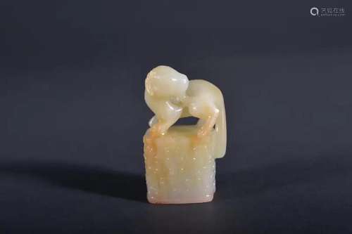 A CARVED WHITE JADE SEAL