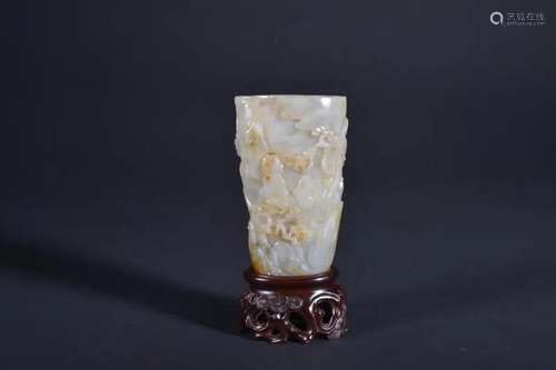 A CARVED WHITE JADE CUP.QING PERIOD