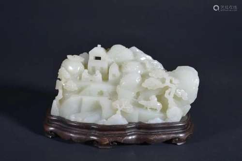 A CARVED WHITE JADE BOULDER.MARK OF QIANLONG