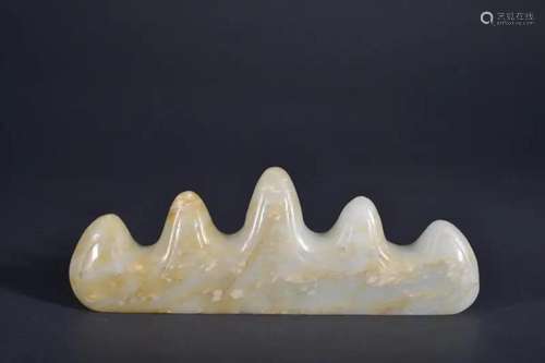 A CARVED WHITE JADE PENREST.QING PERIOD