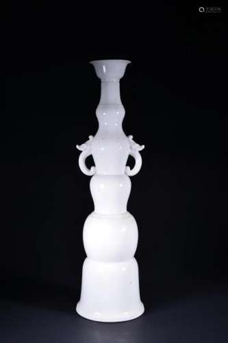 A WHITE-GLAZED CANDLESTICK.QING PERIOD