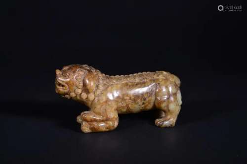 A CARVED JADE LION.QING PERIOD
