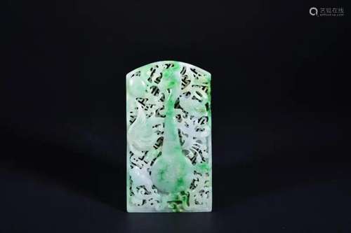 A CARVED JADEITE PLAQUE