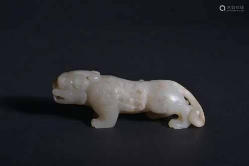 A CARVED WHITE JADE BEAST.QING PERIOD