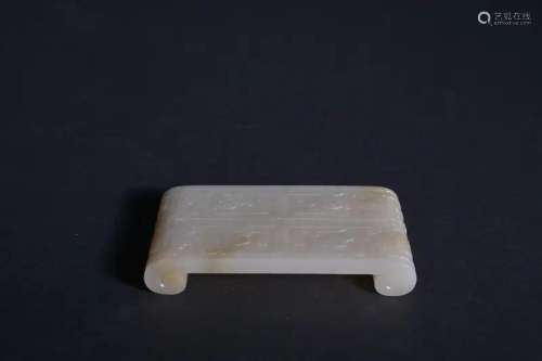 A CARVED WHITE JADE 'DRAGON' PENREST.QING PERIOD